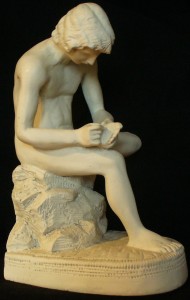 Replica of Boy with Thorn, an ancient Greco-Roman Hellenistic bronze sculpture, currently in the Palazzo dei Conservatori, Rome  